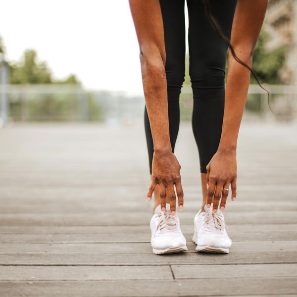 Athlete concentrating before a workout in a well-lit space.